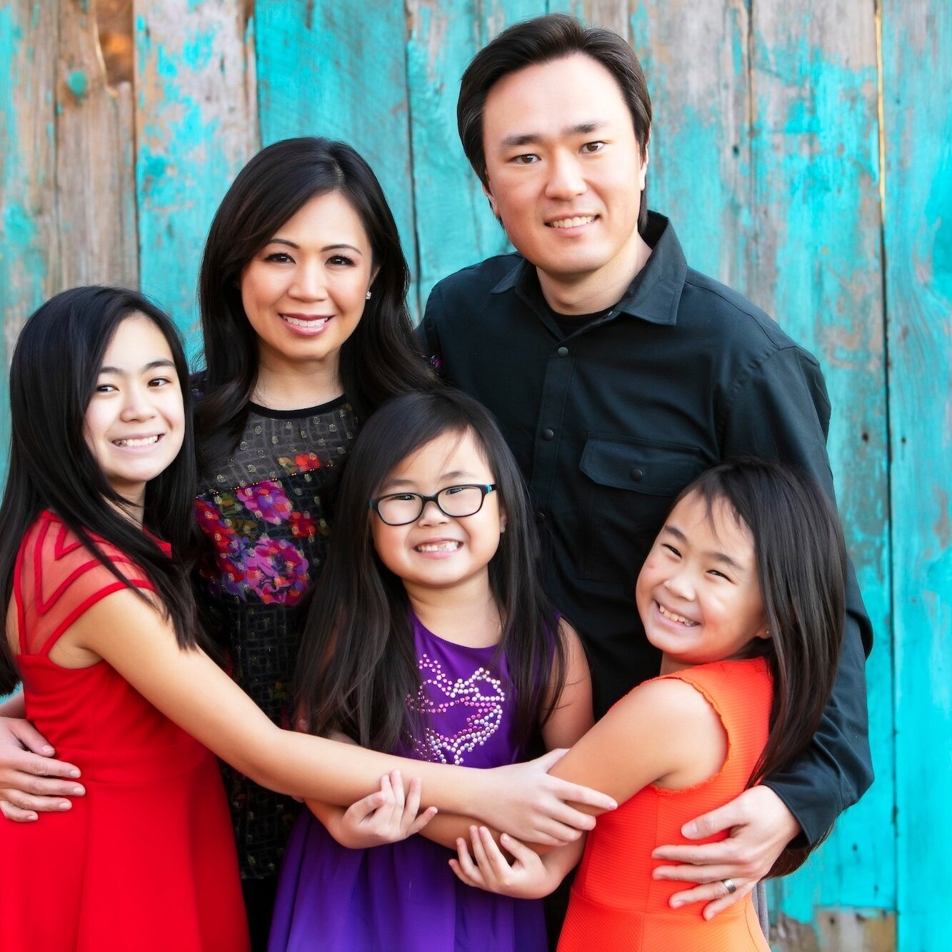 Dr. Beverly Moon and her family, reflecting the family values of Moon Signature Dentistry